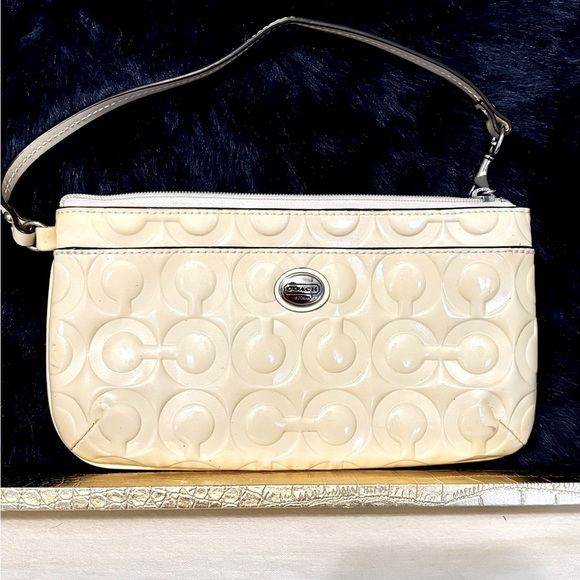 Coach Handbags - Coach Embossed Logo Wristlet - Cream/Silver